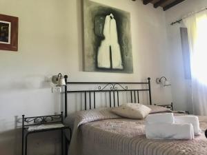 Postel nebo postele na pokoji v ubytování Agriturismo Melodie Toscane Sorano