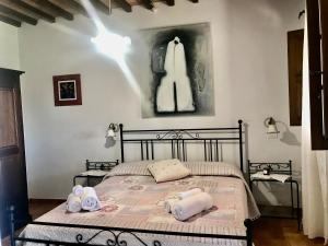 Postel nebo postele na pokoji v ubytování Agriturismo Melodie Toscane Sorano