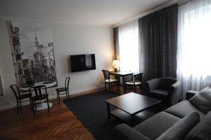 TV a/nebo společenská místnost v ubytování Apartamenty Duo