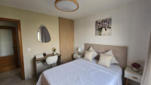 Postel nebo postele na pokoji v ubytování Elegante apartamento en Playa de Gandía