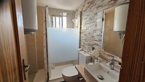 Koupelna v ubytování Elegante apartamento en Playa de Gandía