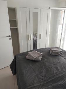 Postel nebo postele na pokoji v ubytování Apartmani Pavic