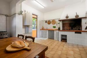 Η κουζίνα ή μικρή κουζίνα στο Tenuta De Paoli