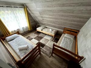 an overhead view of a bedroom with two beds at Haus mit Pool Großschönau in Großschönau +16 photos