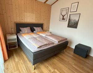 a bedroom with a bed in a room at Chalet Gerbera in Wengen