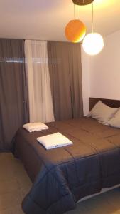 Giường trong phòng chung tại M65 Luxury Suit