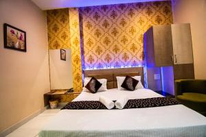 Hotel 7 PM客房内的一张或多张床位