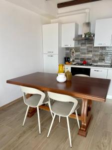 Kuchyň nebo kuchyňský kout v ubytování WindwoW - Your flat in Baunei