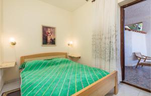Posteľ alebo postele v izbe v ubytovaní 2 Bedroom Nice Apartment In Jablanac