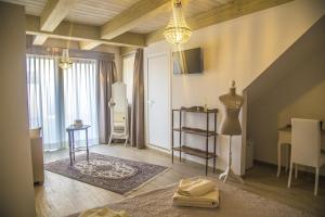 TV a/nebo společenská místnost v ubytování Le Stanze Di Leonardo