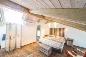 Ένα ή περισσότερα κρεβάτια σε δωμάτιο στο Le Stanze Di Leonardo