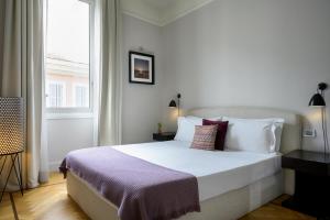 Cama ou camas em um quarto em The Fifteen Keys Hotel