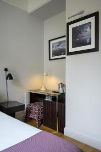 Cama ou camas em um quarto em The Fifteen Keys Hotel