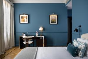 Cama ou camas em um quarto em The Fifteen Keys Hotel