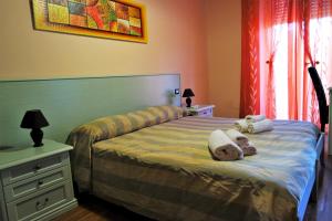 Posteľ alebo postele v izbe v ubytovaní Bosa Guest House