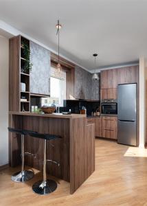 Kuchyň nebo kuchyňský kout v ubytování Athenian Riviera Sea View Penthouse