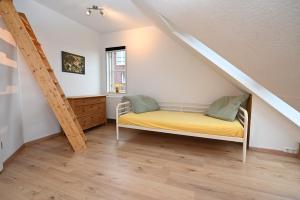 Giường trong phòng chung tại Ferienhaus Dörte