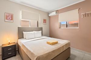 Postel nebo postele na pokoji v ubytování Curadise Living + 37 fotografií