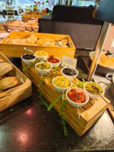 a buffet of different types of food on a table at Hotel Puerto Palace in Puerto de la Cruz