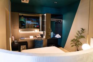 Relais sul Mare Boutique Hotel客房内的一张或多张床位