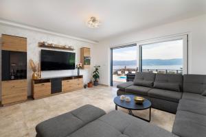 TV a/nebo společenská místnost v ubytování Villa Volare