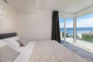 Postel nebo postele na pokoji v ubytování Villa Volare + 124 fotografií