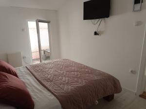 Postel nebo postele na pokoji v ubytování Zemun Central