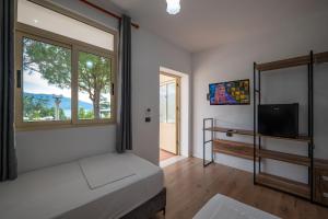 TV a/nebo společenská místnost v ubytování Edva Resort