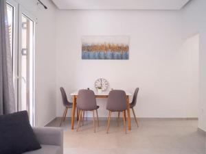 a dining room with a table and chairs at Athens Hill of Harmony in Athens