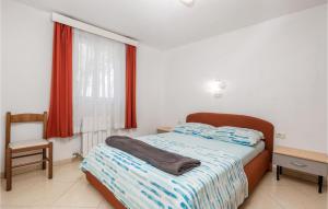 Postel nebo postele na pokoji v ubytování Beach Front Apartment In Punta Kriza