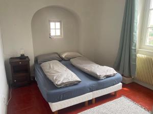 Postel nebo postele na pokoji v ubytování Chez Katia