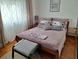 Postel nebo postele na pokoji v ubytování Apartments Anita