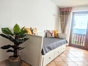 Katil atau katil-katil dalam bilik di Ferienwohnung AllgäuGlück im Ferienpark Oberallgäu mit Hallenbad, Sauna, WLAN +45 gambar