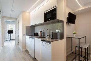 Η κουζίνα ή μικρή κουζίνα στο Aparthotel Vilassar
