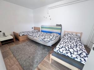 Postel nebo postele na pokoji v ubytování TOP 2 Geräumiges 2 Zimmer Apartment für bis zu 6 Personen