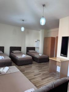 Postel nebo postele na pokoji v ubytování Hotel Balkan + 15 fotografií