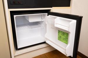 Kuchyň nebo kuchyňský kout v ubytování Garden Otsuka