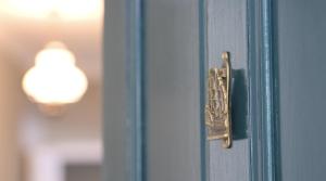 a door with a brass door knob on it at Sancreed House Bed and Breakfast in Penzance