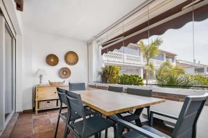 A balcony or terrace at BEACHFRONT GOLDEN MILE PUENTO ROMANO SEA VIEW WIFI