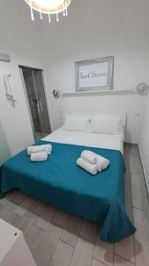 Giường trong phòng chung tại Borgo28