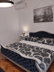 Postel nebo postele na pokoji v ubytování Keti House