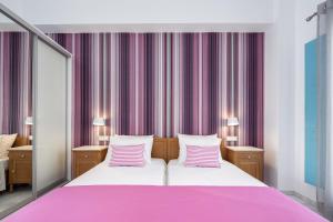 Letto o letti in una camera di Santellini Hotel