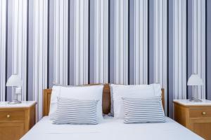 Letto o letti in una camera di Santellini Hotel