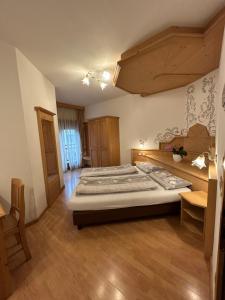 Postel nebo postele na pokoji v ubytování Hotel Franco
