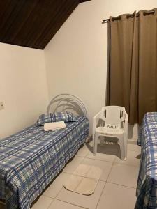 Postel nebo postele na pokoji v ubytování Chalé Encantador em Bananeiras