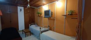 Postel nebo postele na pokoji v ubytování Departamento familiar