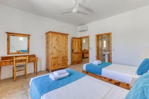 Postel nebo postele na pokoji v ubytování Ta Frenc Apartments