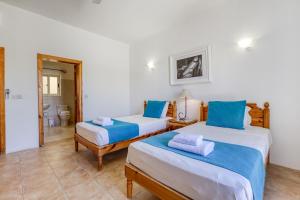 Postel nebo postele na pokoji v ubytování Ta Frenc Apartments