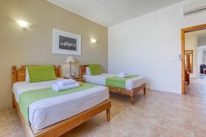 Postel nebo postele na pokoji v ubytování Ta Frenc Apartments