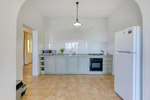 Kuchyň nebo kuchyňský kout v ubytování Ta Frenc Apartments